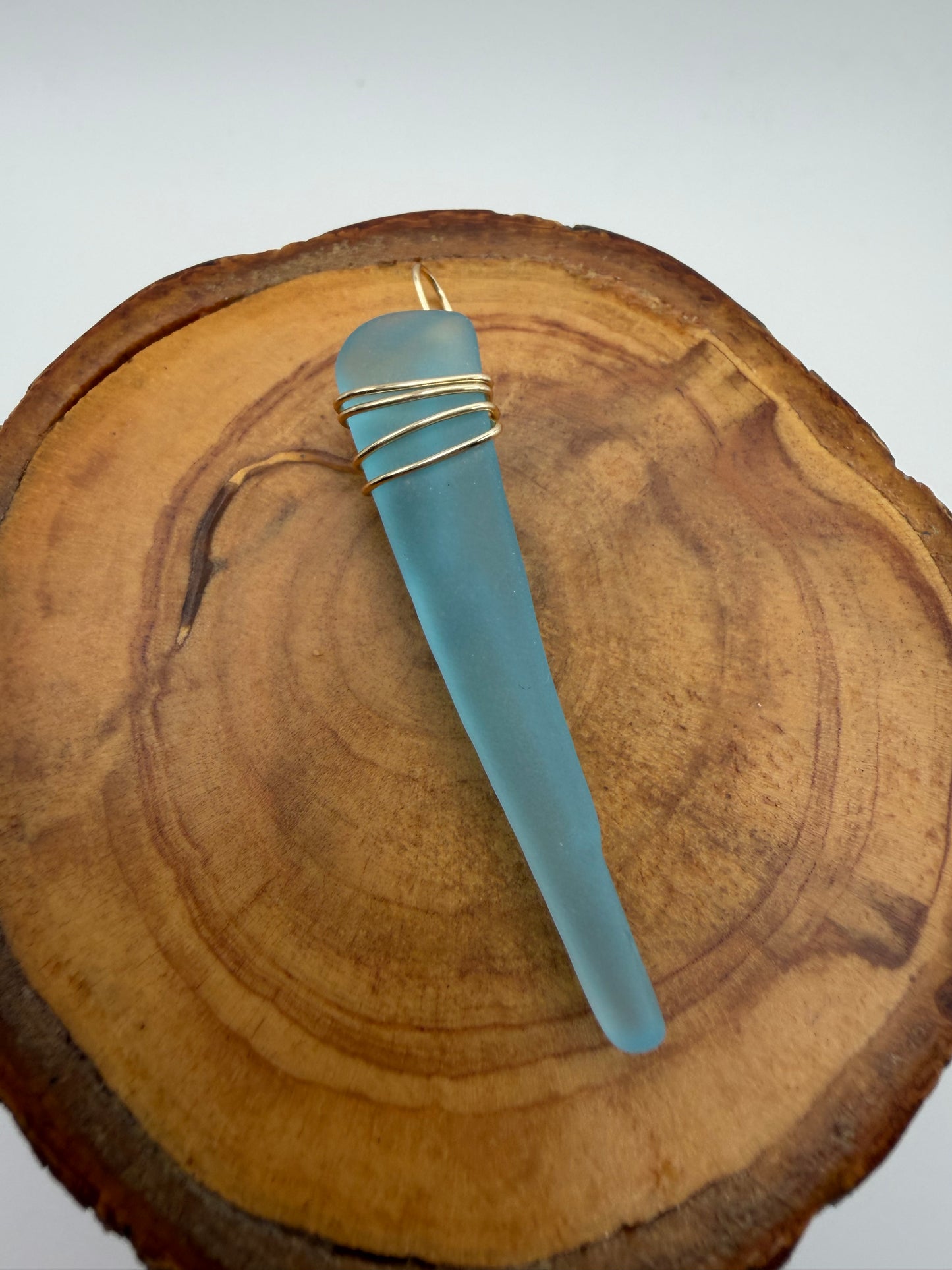 Hand Wrapped Blue Tumbled Glass Pendant with Gold Wire Wrap