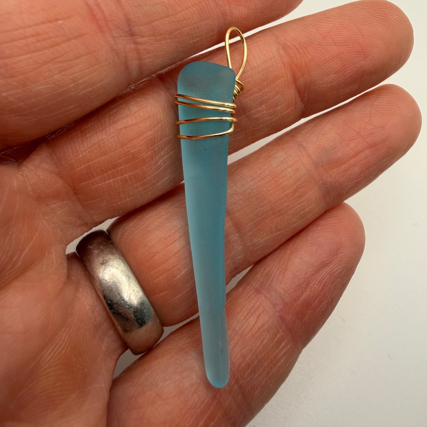 Hand Wrapped Blue Tumbled Glass Pendant with Gold Wire Wrap